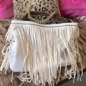 White leather ladies handbag with gorgeousous front and a crossbody strap